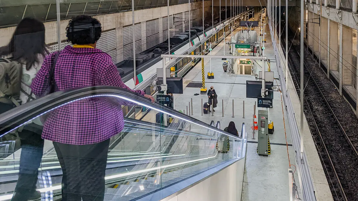 An escalator connects CDG airport's main terminal level with the RER station platforms.