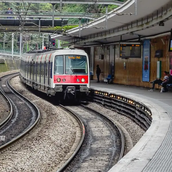 A Paris RER Line B train enters the Cit� Universitaire station.
