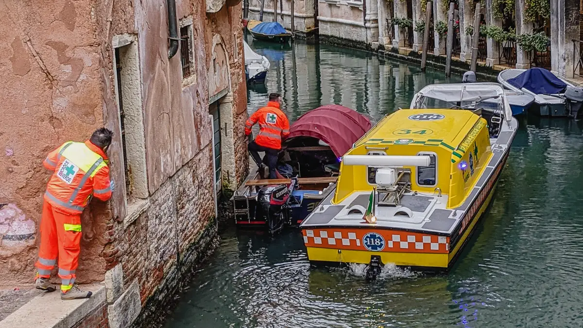 An ambulance responds to a medical emergency in Venice, Italy's Campo dei SS. Apostoli.